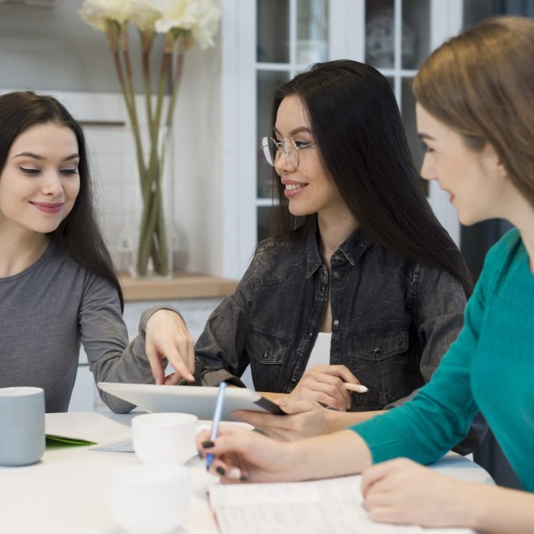 group-young-women-making-plans-together